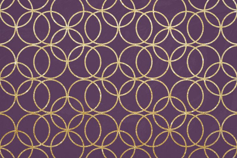 紫色背景上的金色圆环的纹理背景