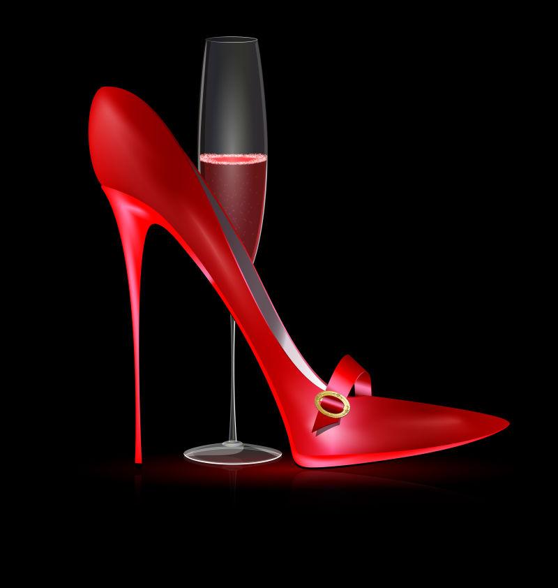 黑色背景中红色玻璃杯的红色鞋子