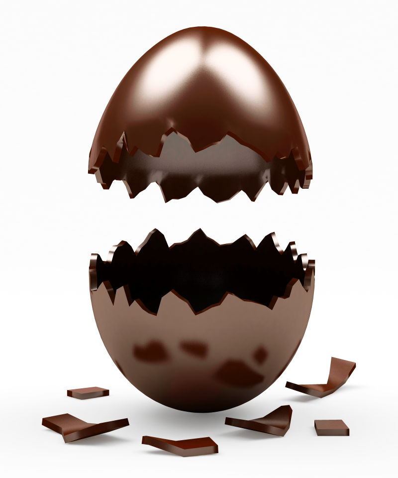 白色背景下破碎的巧克力复活节彩蛋