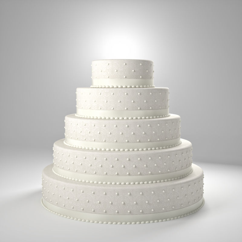 白色背景前珍珠装饰的蛋糕