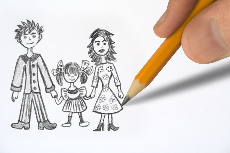幸福的家庭和手上的铅笔