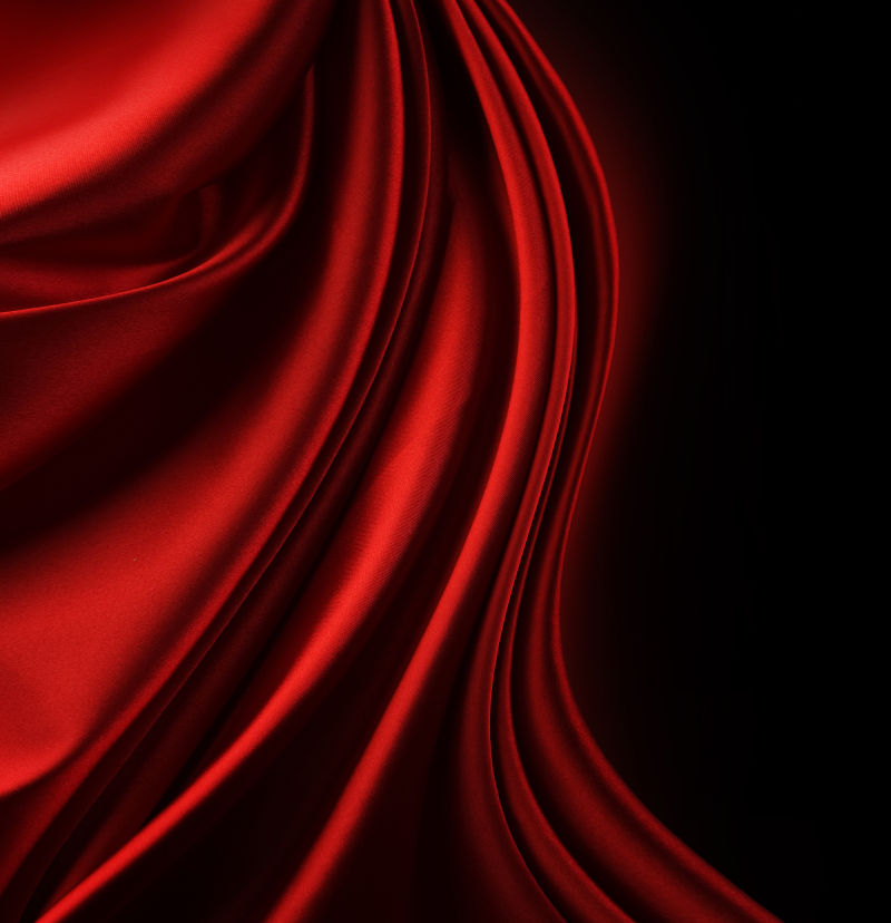 黑色背景中的抽象红丝带艺术