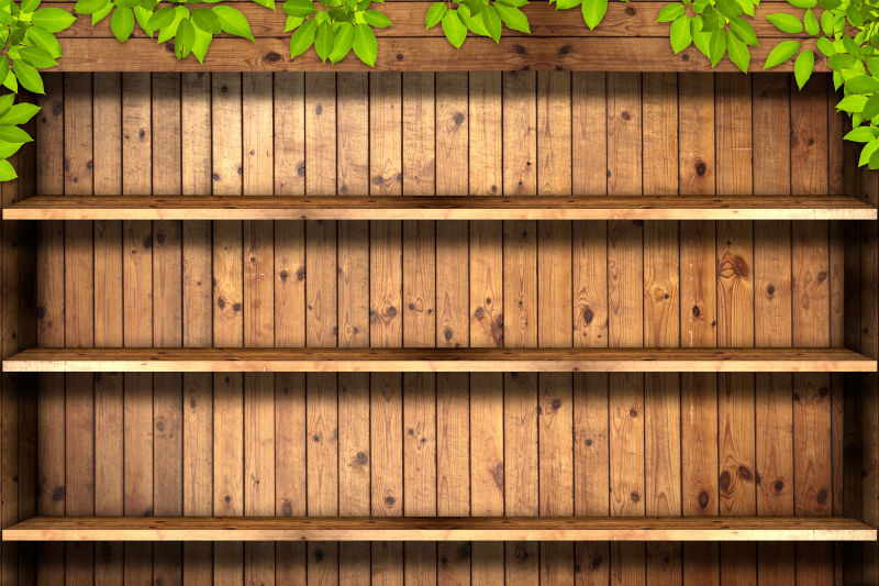 木质橱柜上的绿色叶子