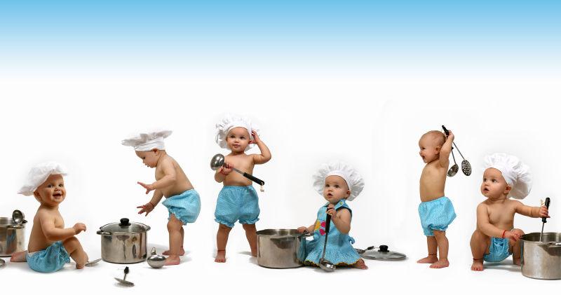 白色背景中的婴儿炊事班