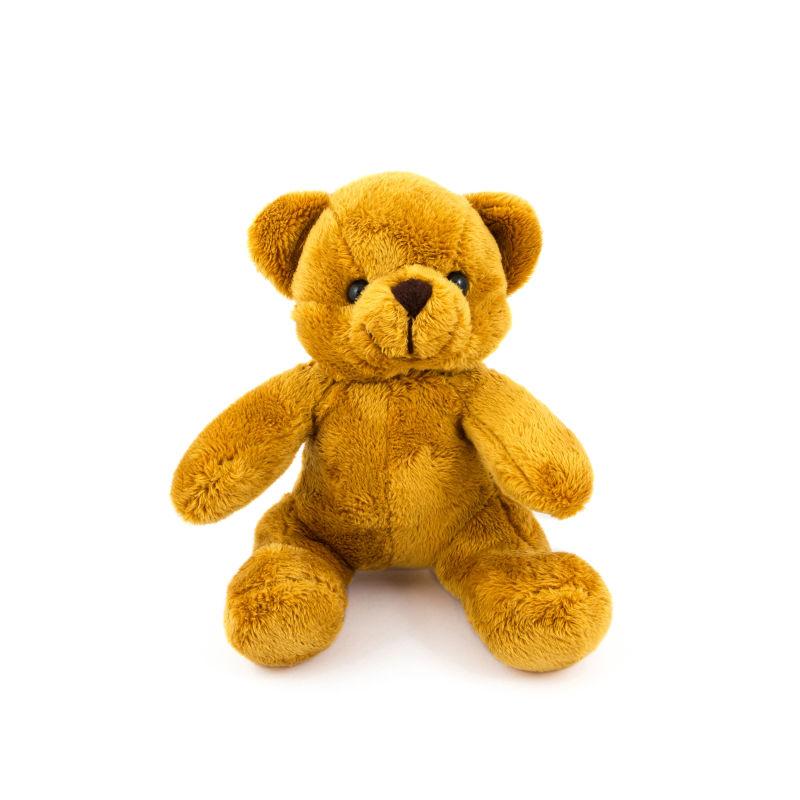 白色背景上的棕黄色的泰迪熊