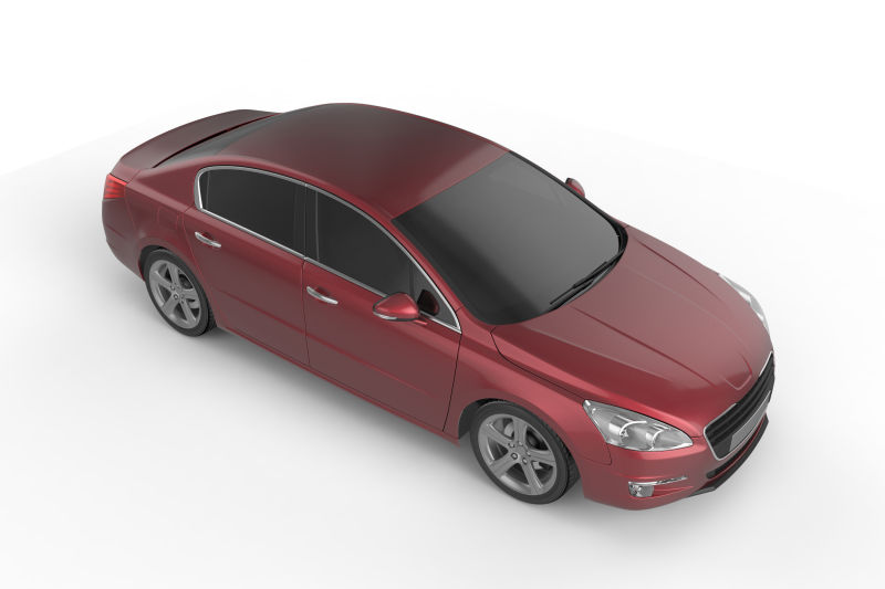 白色背景下的红色汽车模型的侧面创意设计