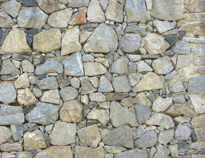 大块石头垒起来的石墙纹理背景