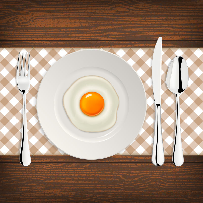 矢量餐布上的餐具与煎蛋