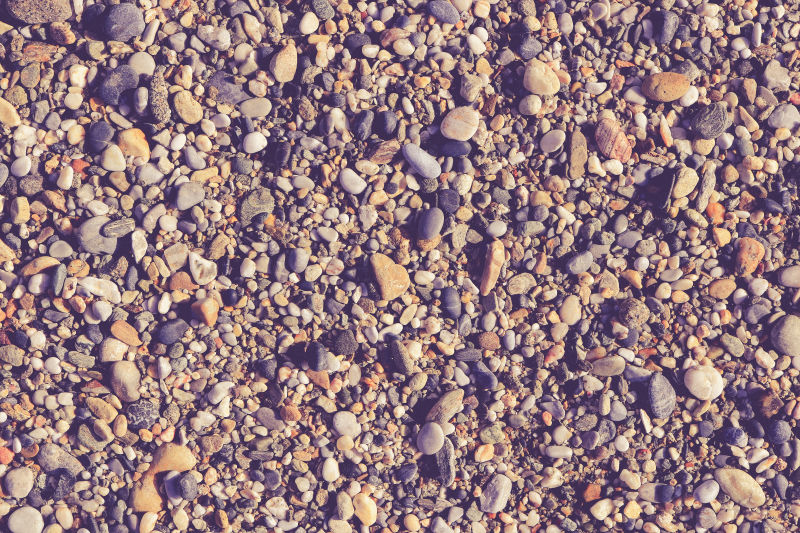海滩上有很多小石子小石子的纹理钠