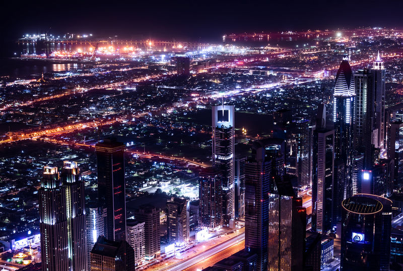 阿联酋迪拜城夜景繁华市区鸟瞰美景全景城市景观奢华的建筑旅游和旅游理念