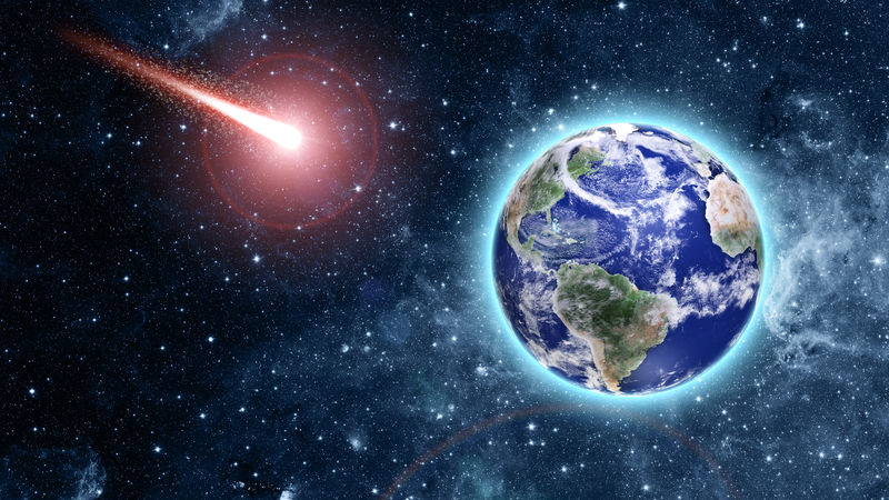 这张由美国宇航局提供的图片中的元素来自太空中蓝色行星的彗星