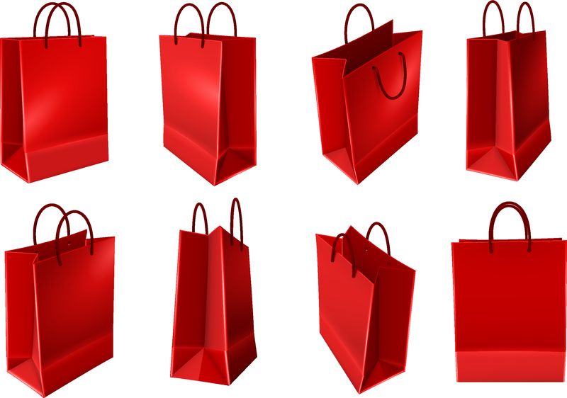 一套红色购物袋-由塑料或纸制成-把手放在透明背景隔离矢量图上