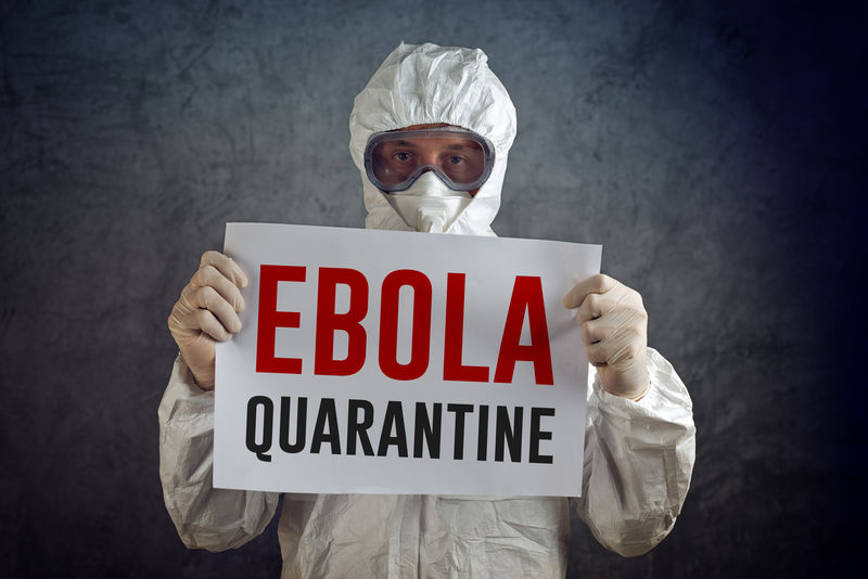 埃博拉检疫标志由医护人员佩戴防护服、手套、面罩和护目镜