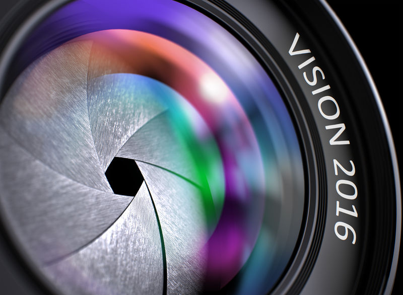 视觉2016-单反相机镜头概念，彩色镜头反射，特写。2016年愿景写于相机镜头上。特写镜头，选择性聚焦，镜头闪光效果。愿景2016理念。三维。