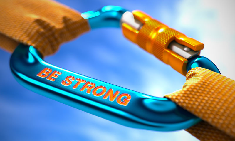 蓝色的钩环和象征着强壮的两条橙色绳索之间的紧密联系。选择性聚焦。3D渲染。