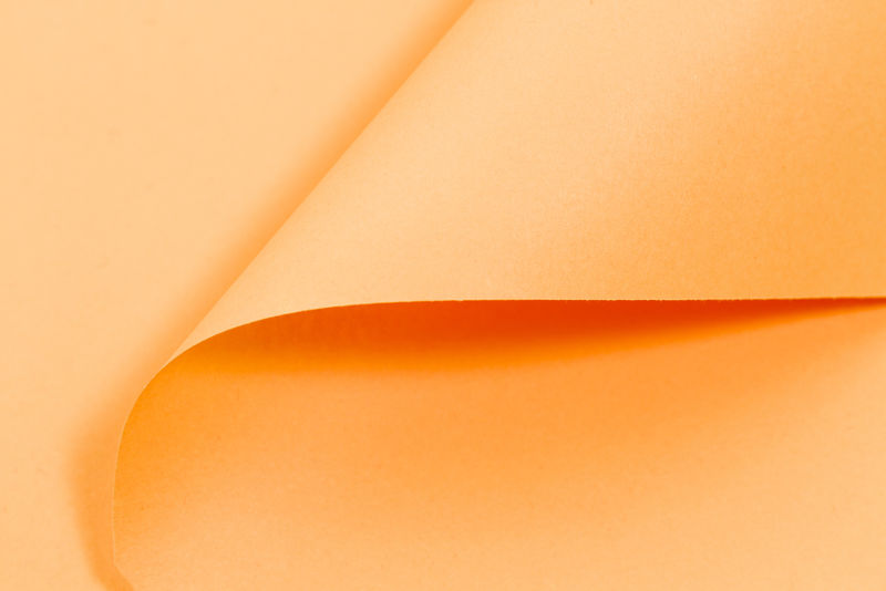 橙色彩纸纹理背景