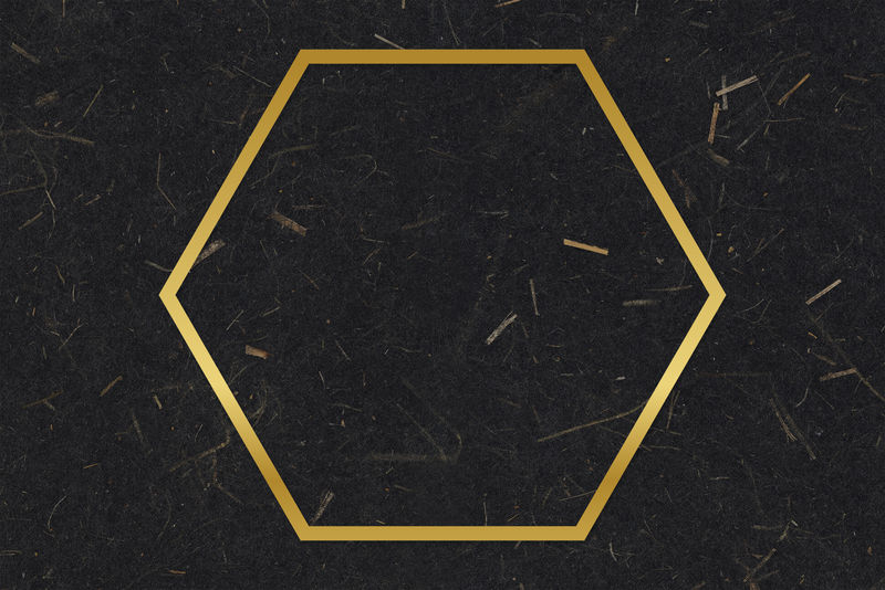 黑色桑椹纸纹理背景上的金色六边形框架