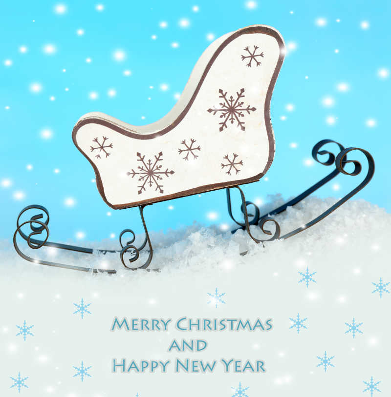 圣诞主题背景上的雪橇装饰品