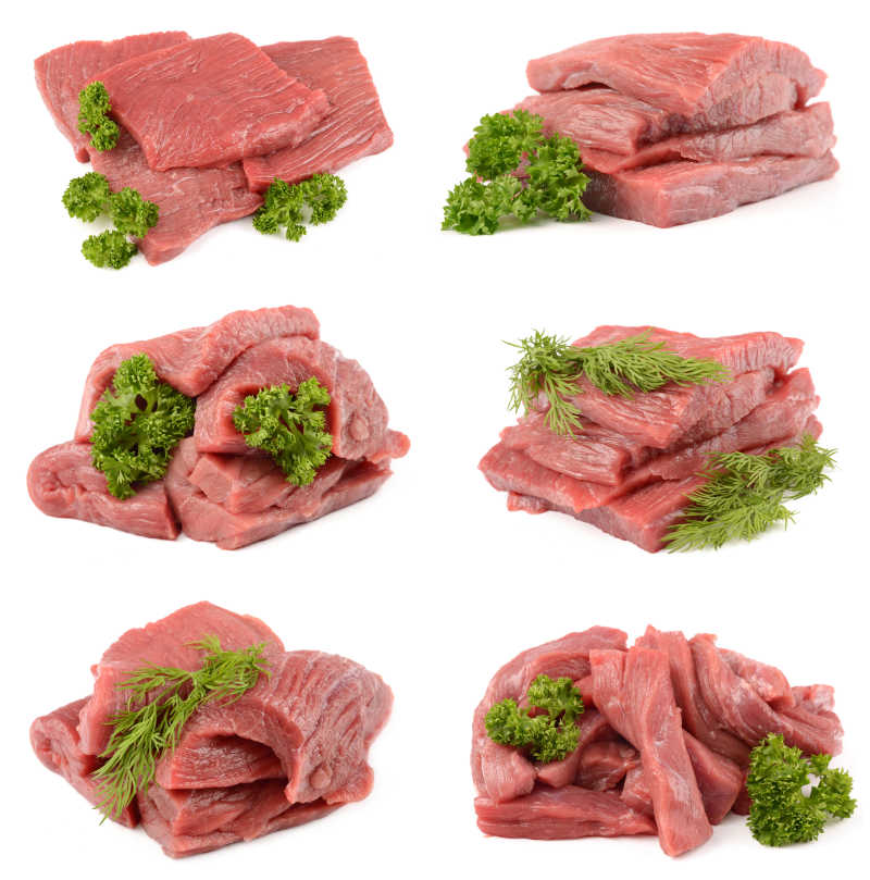 白色背景下的红色生肉包裹着绿色蔬菜