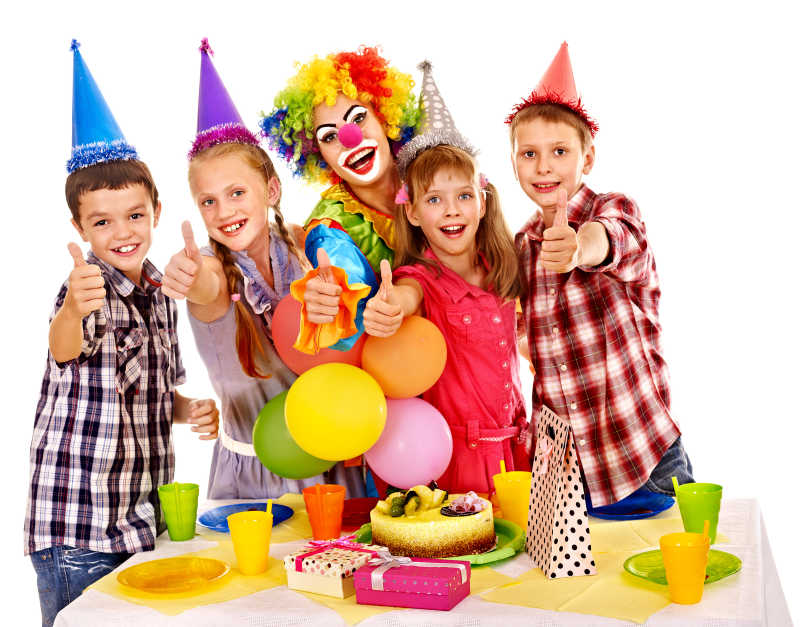 生日派对快乐的少年小丑和孩子们