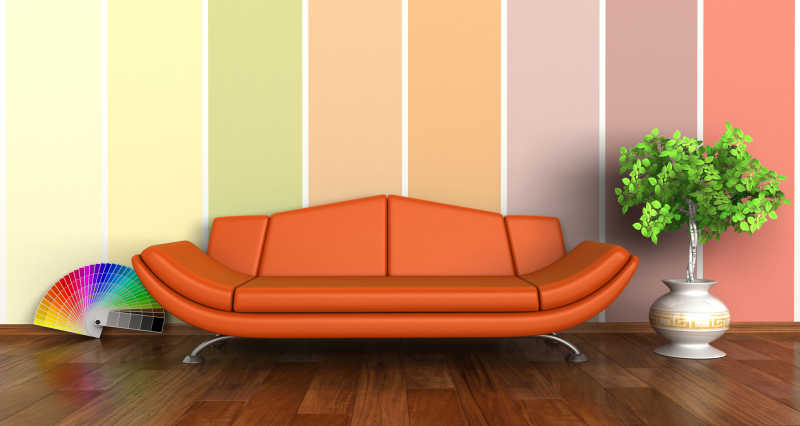 多色条纹壁纸下的橘色沙发