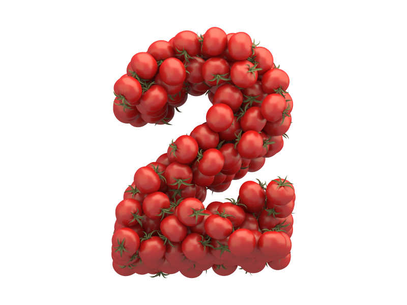 白色背景上西红柿组成的数字2