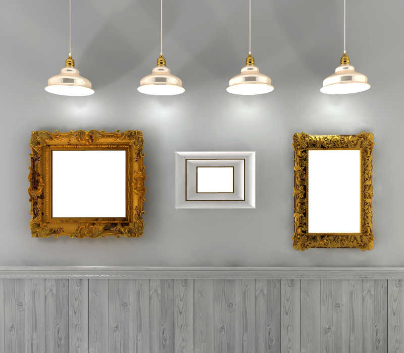 四个吊灯和灰色背景墙上的空白复古画框