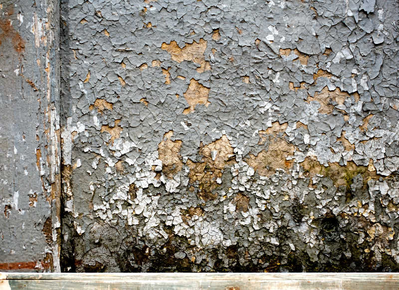 墙皮开裂脱落的老旧墙壁背景