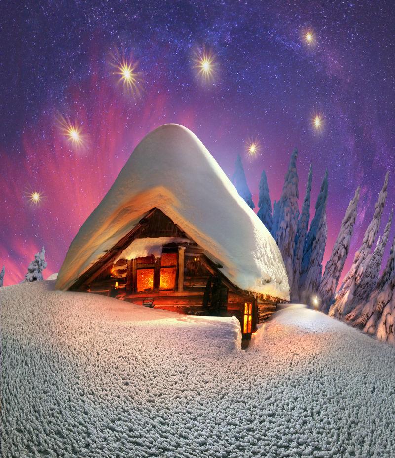幻想烟火下的雪中小屋子