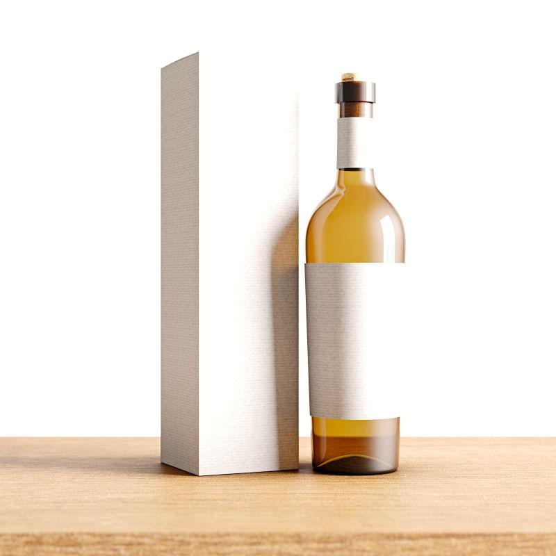 酒瓶与白色包装盒在木桌上