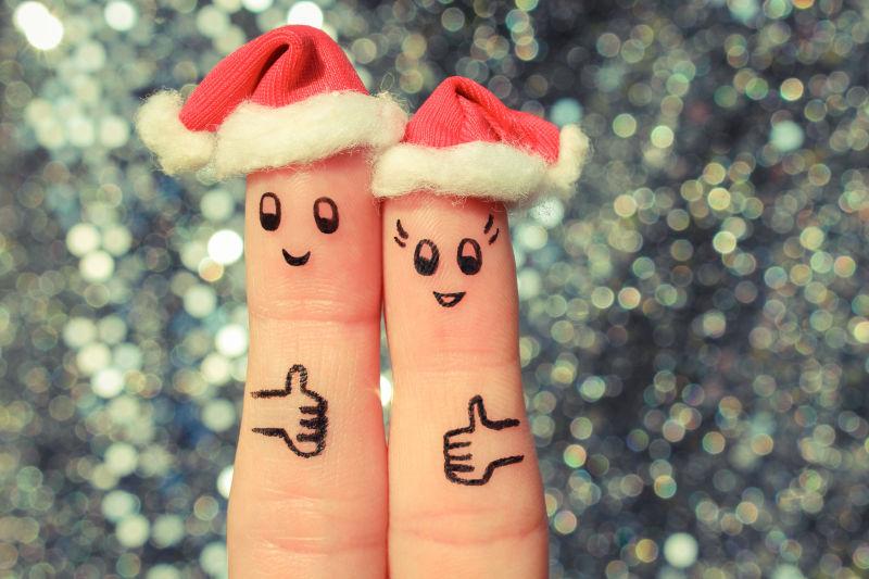 夫妇的手指艺术庆祝圣诞节